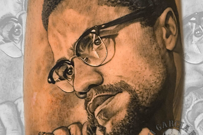 Tatuaje realista retrato de Martin Luther King. Autor: Xavi Boix